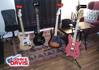 Fender, Charvel and Gibson Les Paul Guitars